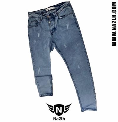 بنطلون جينز مخدوش